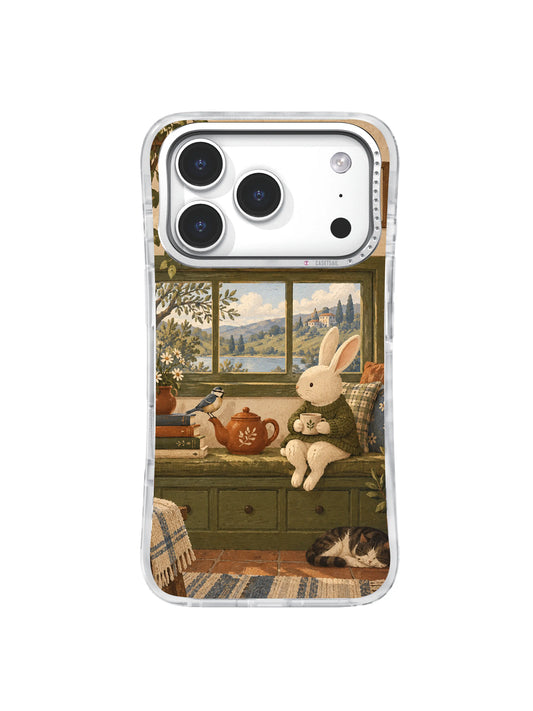 Cream rabbit with terracotta teapot on an olive window bench phone case artwork