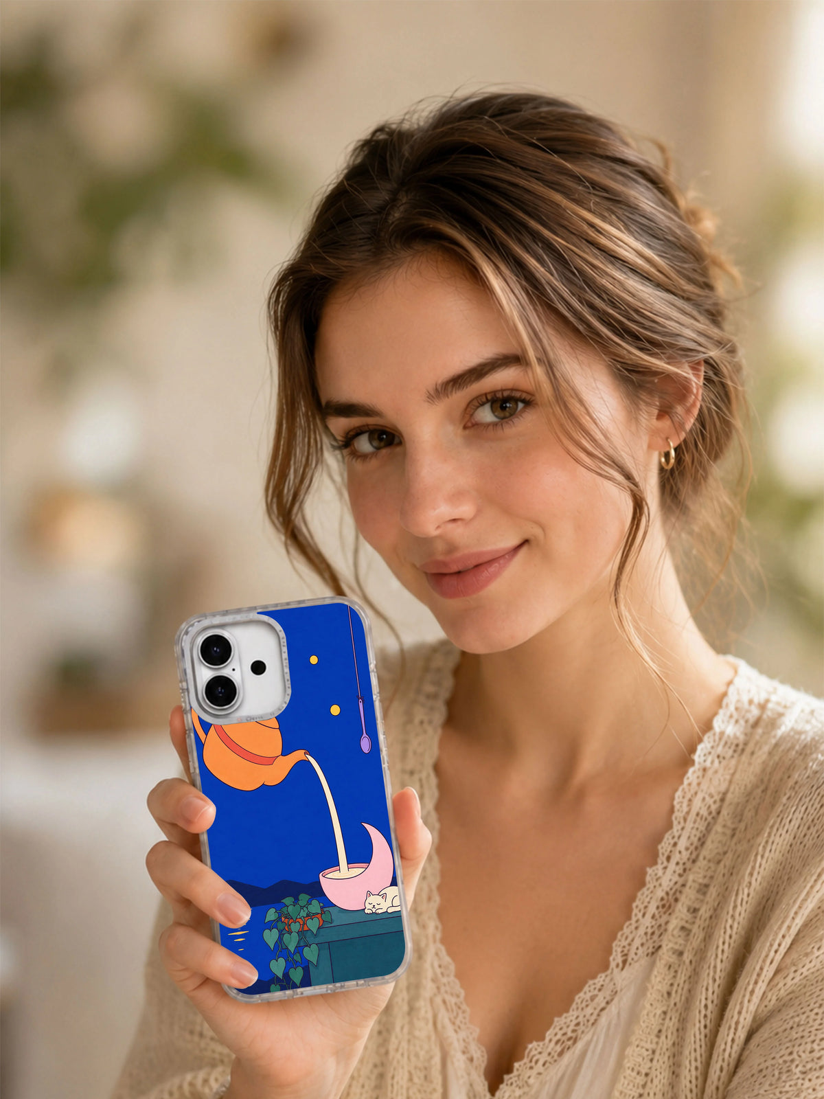Lifestyle portrait showing Tea for the Low Moon iPhone 17 case