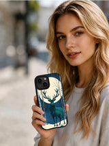 Teal Reindeer Moon iPhone 13 case shown in an outdoor lifestyle setting