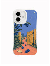 Midnight blueberries scattered before a warmly painted garden gate on a dusty blue phone case