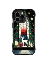 Black iPhone 15 Pro case showing a white deer by a wrapped gift inside a tall window with a crimson winter sky