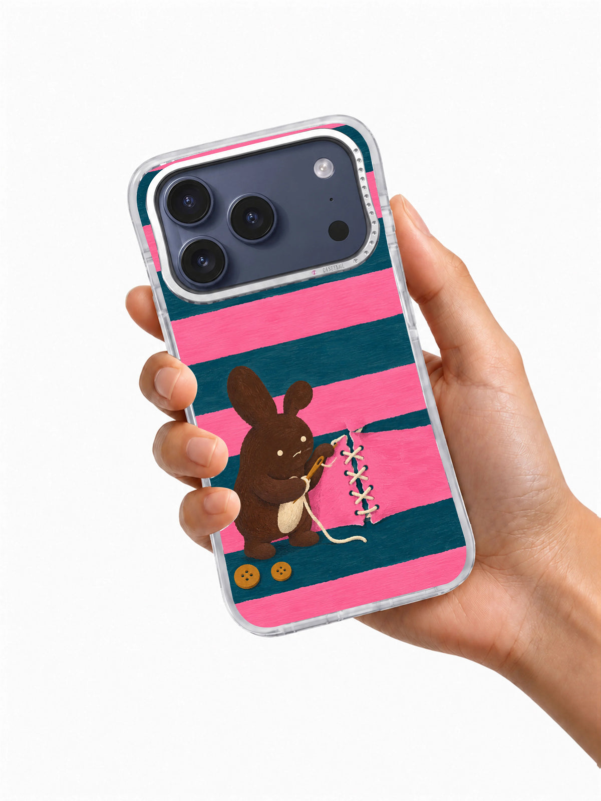 The Ribbon Repair Shop iPhone 17 Pro case held in hand