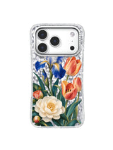 Cream camellia, cobalt iris and coral tulips meet on a transparent iPhone 17 Pro case