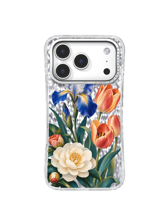Cream camellia, cobalt iris and coral tulips meet on a transparent iPhone 17 Pro case