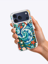Tinsel Tide Whale iPhone 17 Pro Max case held in hand