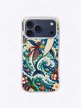 Tinsel Tail Gift Wave whale artwork on an iPhone 17 Pro Max case