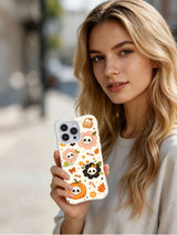 Tiny Skeleton Flower Picnic iPhone 14 Pro case held in hand