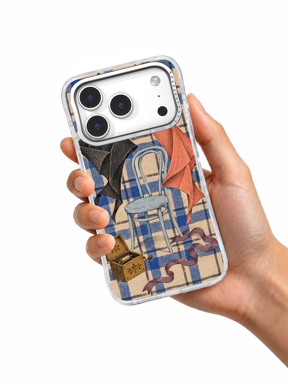 Hand holding a clear iPhone 17 Pro case with dancing handkerchief plaid artwork