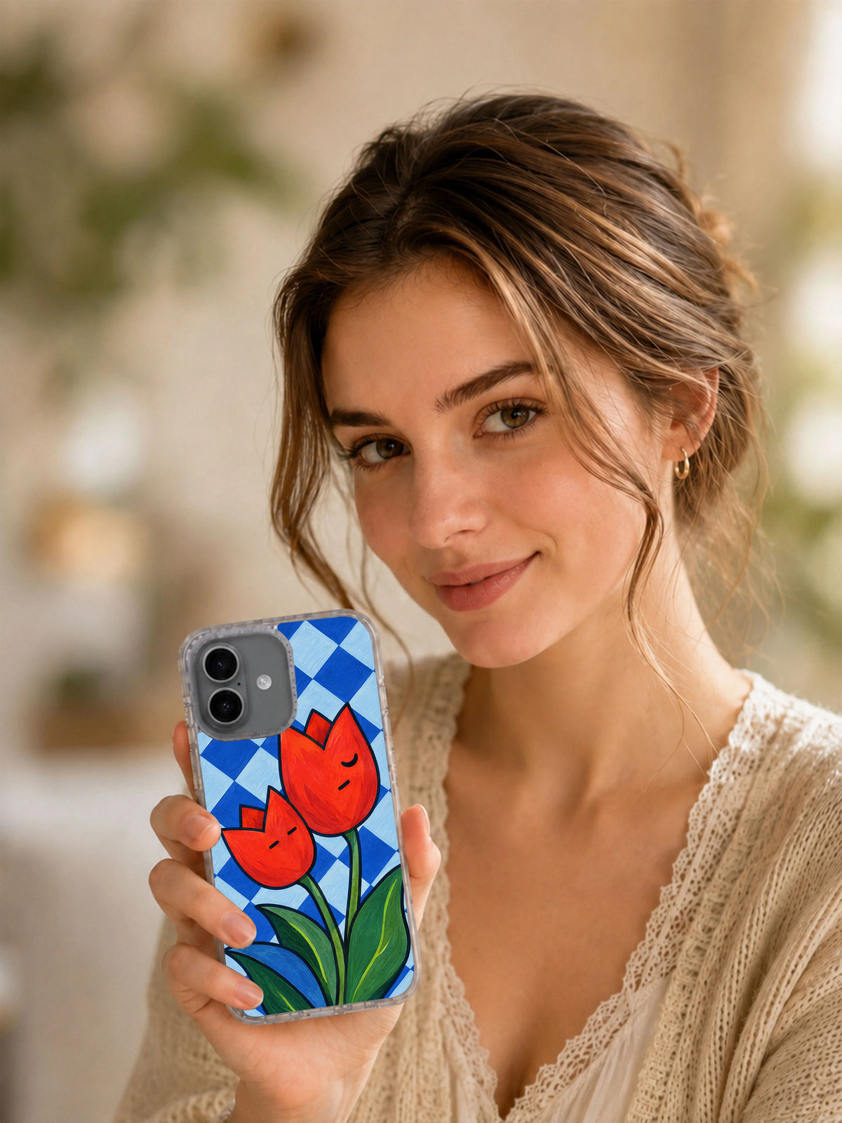 Two Notes of Spring tulip iPhone 17 case lifestyle portrait