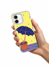 The Umbrella That Grew Roots iPhone 17 case shown naturally in hand
