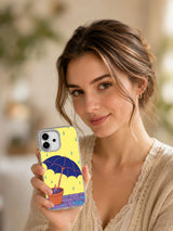 Lifestyle portrait showing The Umbrella That Grew Roots iPhone 17 case