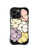 Velvet Pastel Petal Stack: Oversized cream, blush, lavender and yellow flowers stack across a black field.