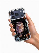 Violet Owl Garden iPhone case held in hand showing violet owl and botanical night artwork