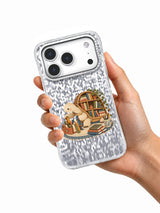 Hand holding The Walking Bookshelf clear iPhone 17 Pro case