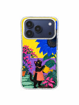 Sunflower Canopy pattern with a cropped cobalt bloom above a black cat gardener and violet wall on an iPhone 17 Pro case