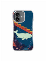 Mint whale emerging from the shadow beneath red stairs in a deep sea reef