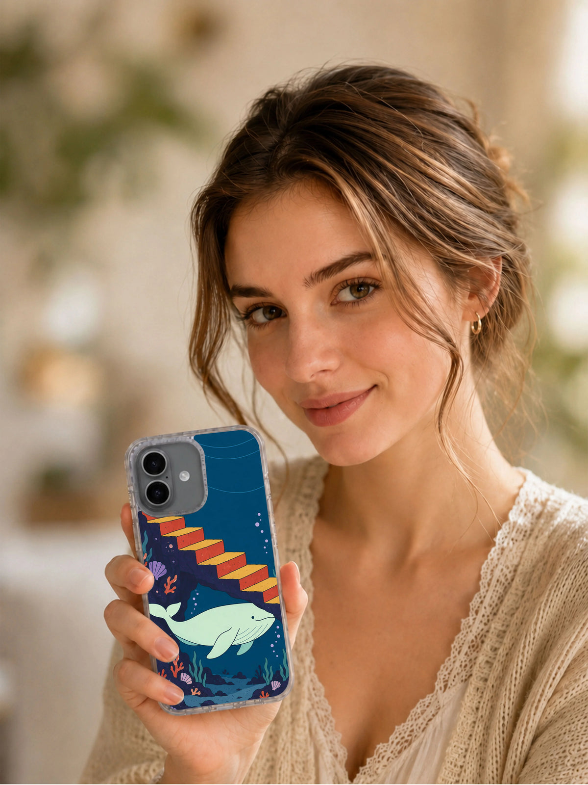 Lifestyle portrait showing Whale Under the Stair iPhone 17 case