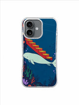 Mint whale entering a narrow gap under red and yellow stairs in open blue water