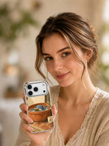 Lifestyle view of a person holding the Whale in the Washbasin transparent iPhone 17 Pro case