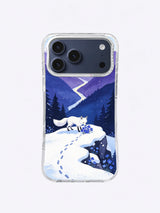White fox following a snow path toward violet mountains on an iPhone case