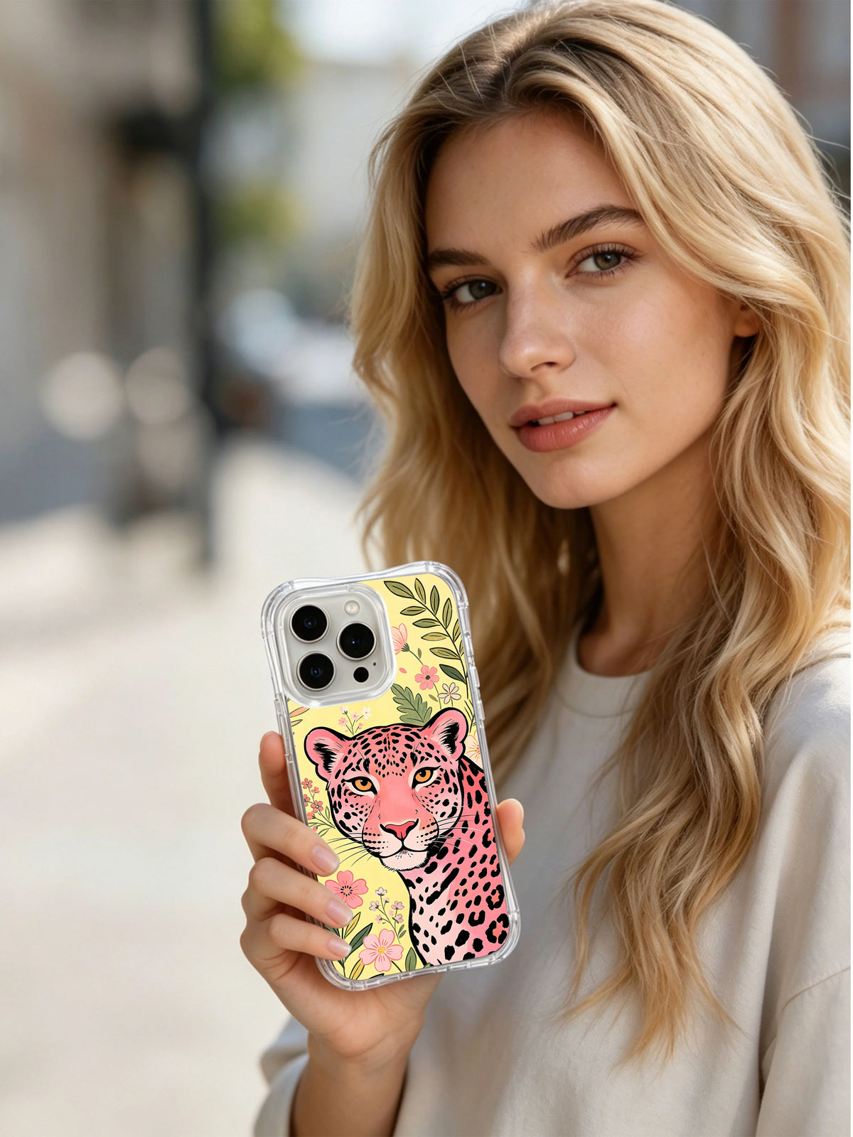 Lifestyle view of Wild Flower Leopard Spirit iPhone 13 Pro Max case in the tall meadow portrait pattern