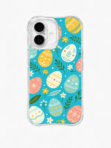Wildflower Egg Festival / Festival Egg Scatter: Large yellow, pink and pale green eggs scattered among daisies and leafy sprigs.