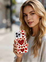 Wildflower Promise leopard heart iPhone 16 Pro case in hand