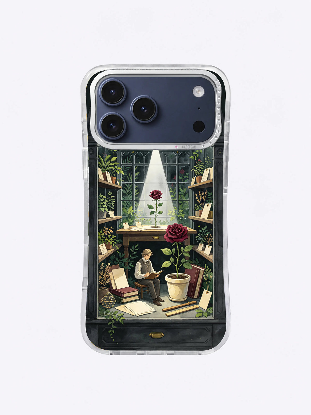 Plant recorder observing a winter rose among parchment botanical records on an iPhone 17 Pro Max case