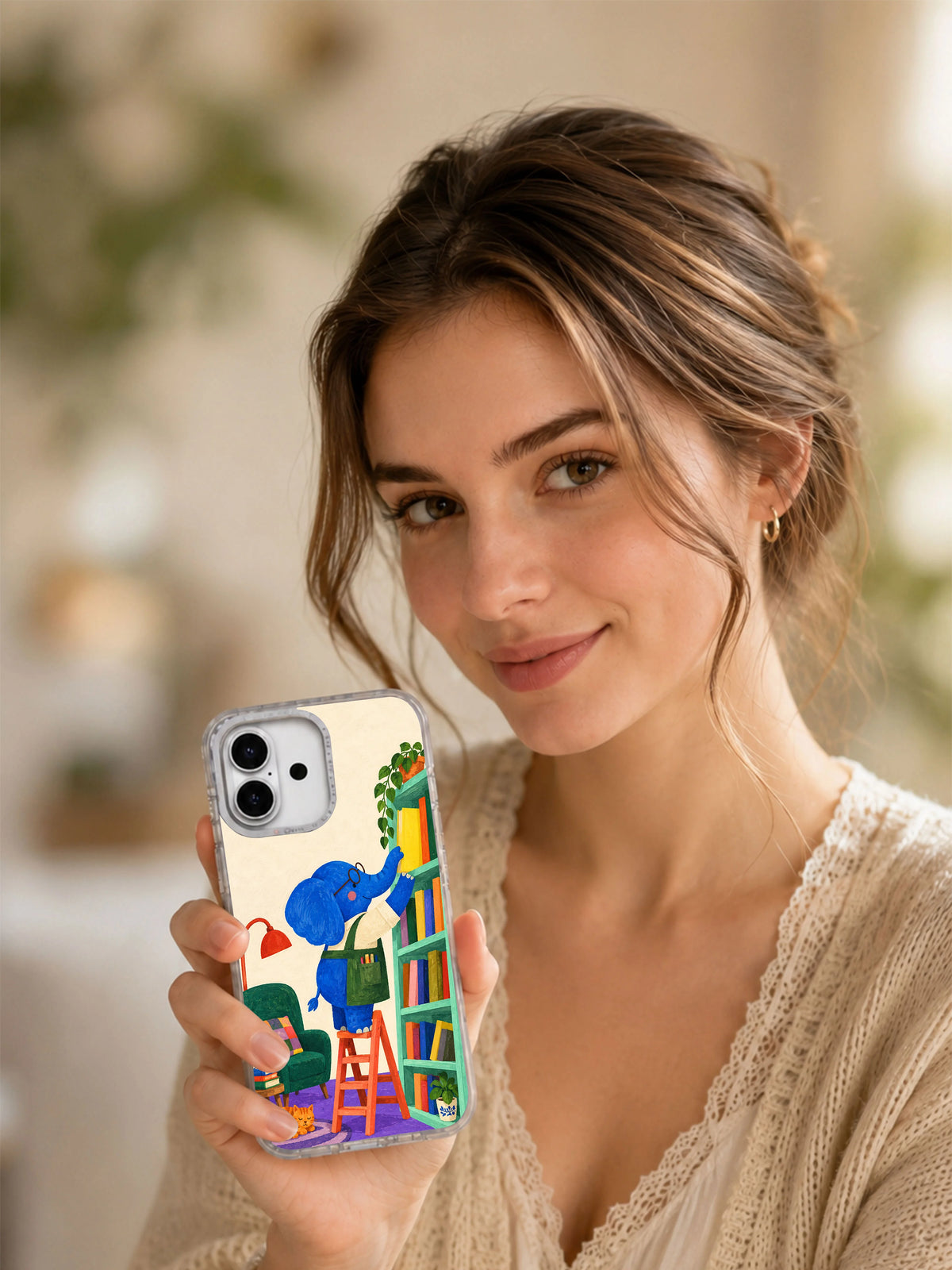 The Yellow Book Above iPhone 17 Pro transparent case lifestyle view